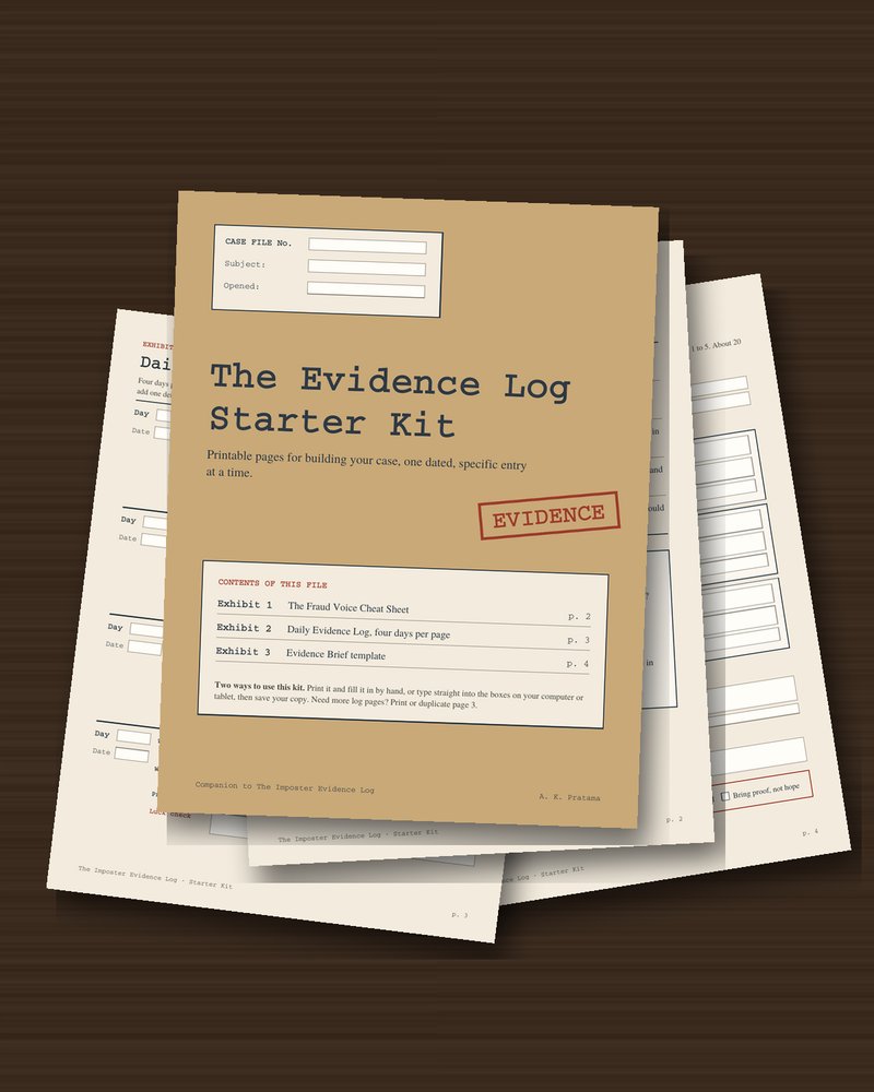 The Evidence Log Starter Kit pages fanned out on a walnut desk